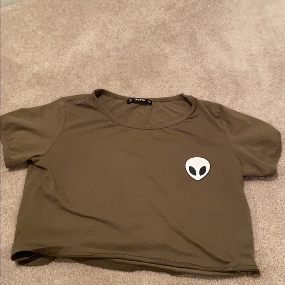 Green crop top and an alien on the front